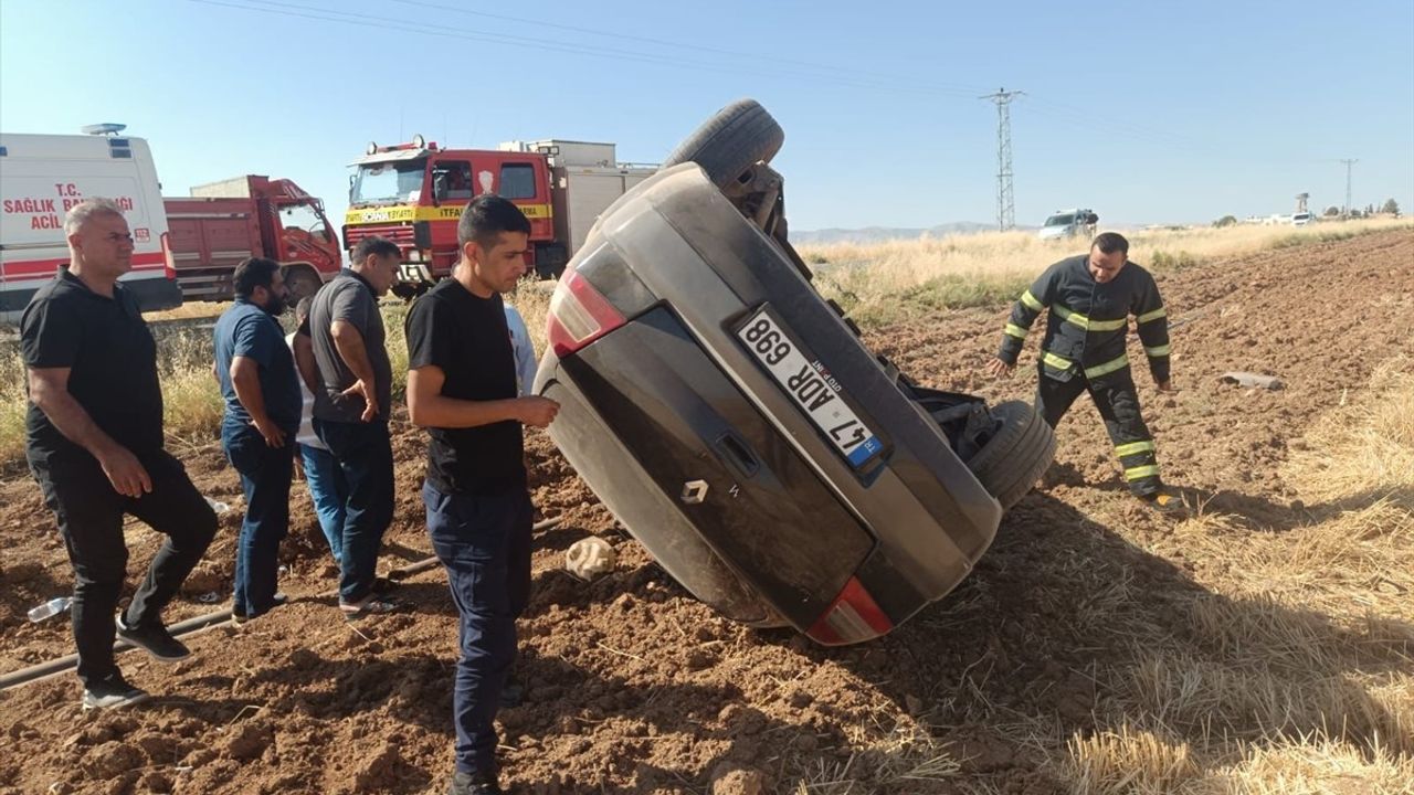 Mardin'de Tarlaya Devrilen Araçta Baba ve Kızı Yaralandı