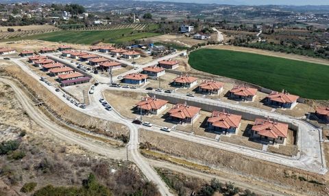 Osmaniye'de Depremzedelere 32 Yeni Köy Evi Teslim Edildi